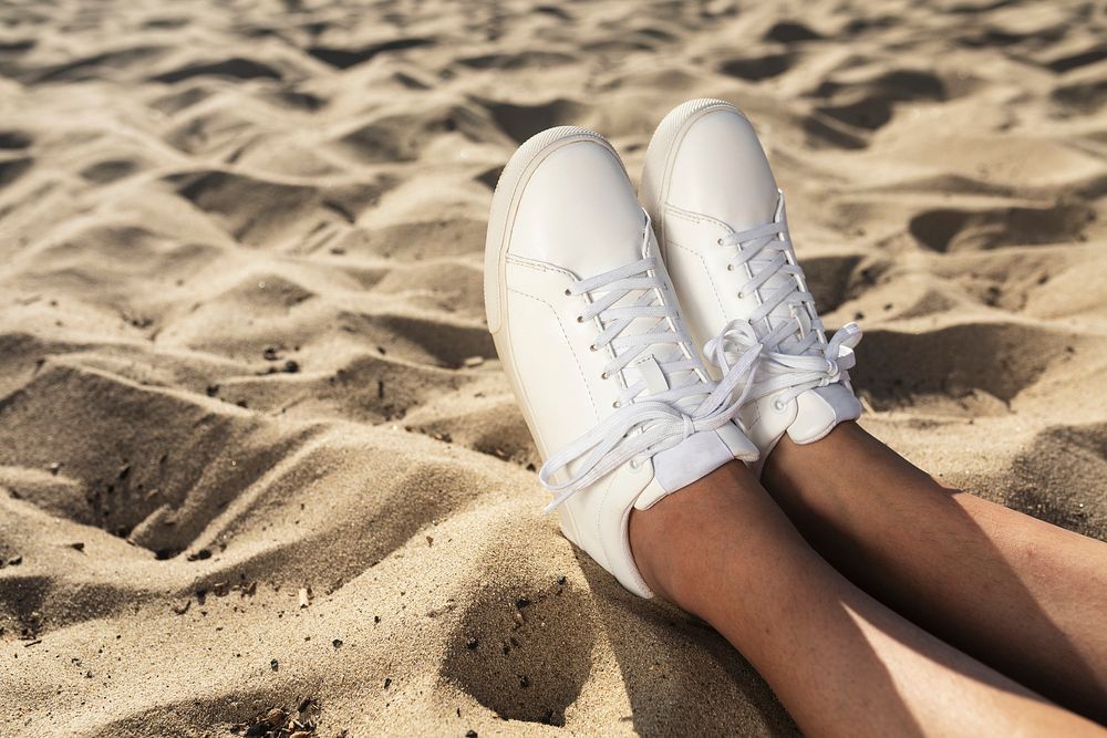 White sneakers closeup men&rsquo;s apparel summer fashion beach photoshoot