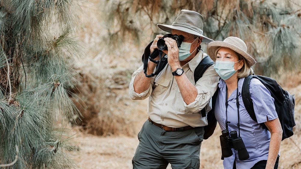 Active senior couple enjoying the beauty of nature during Covid-19 pandemic