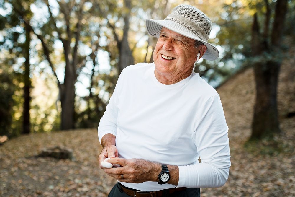 Grandpa&rsquo;s apparel mockup psd using his wireless earbuds