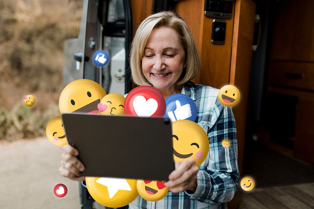 Senior woman psd enjoying social media browsing on tablet