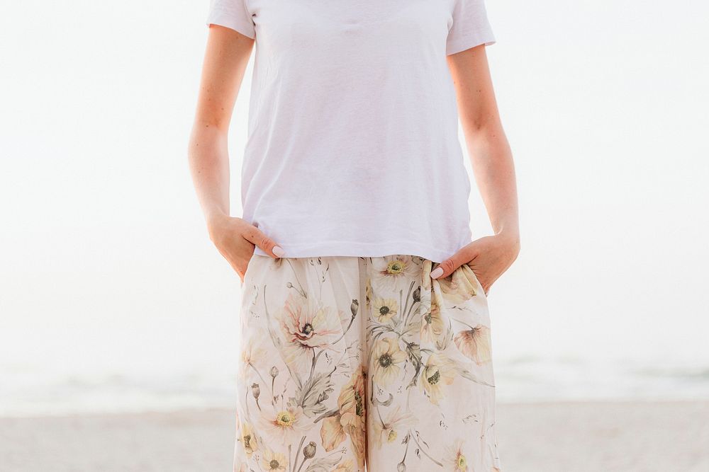 Woman in a casual summer outfit at the beach