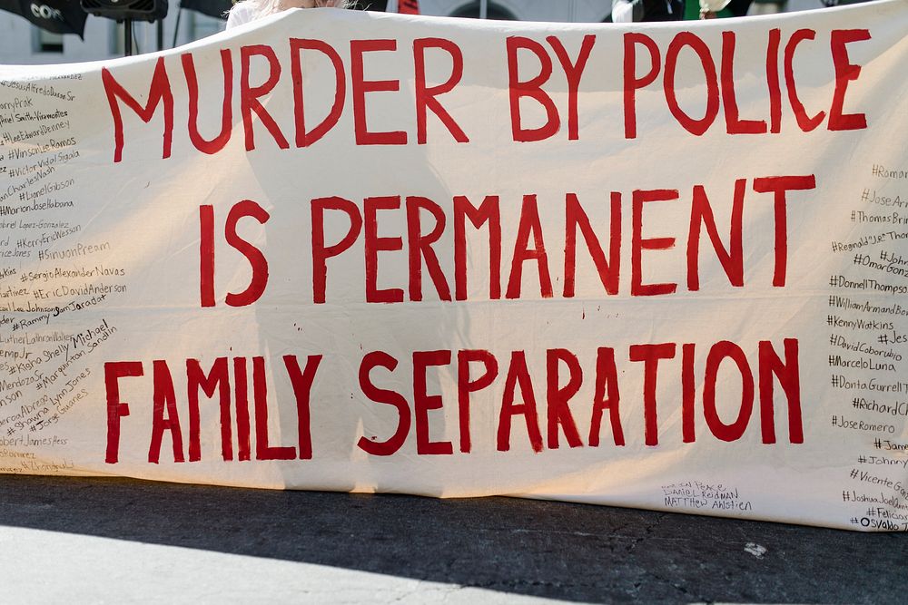 Murder by police is permanent family seperation banner at a Black Lives Matter protest outside the Hall of Justice in…