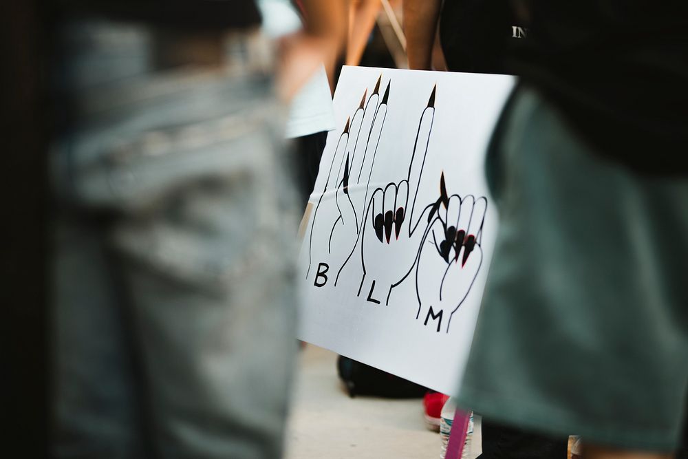 Hand gestures on a board at a Black Lives Matter protest outside the Hall of Justice in Downtown Los Angeles. 15 JUL, 2020 -…