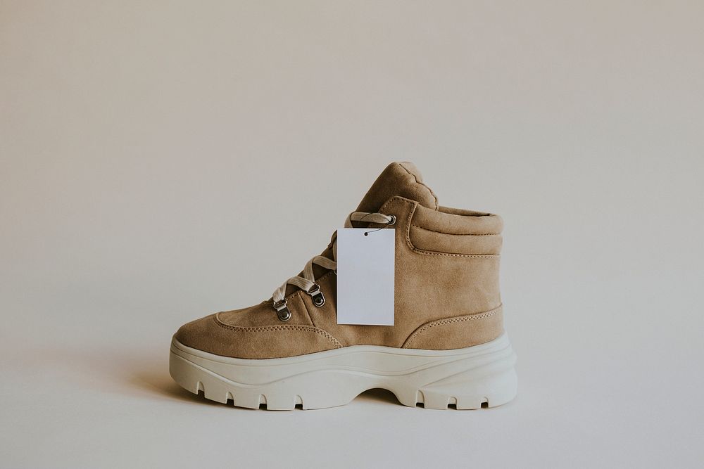 Blank label on brown suede high top sneakers