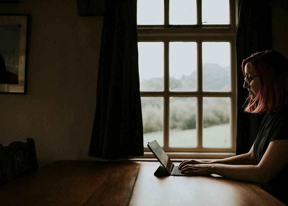 Woman working on a digital tablet