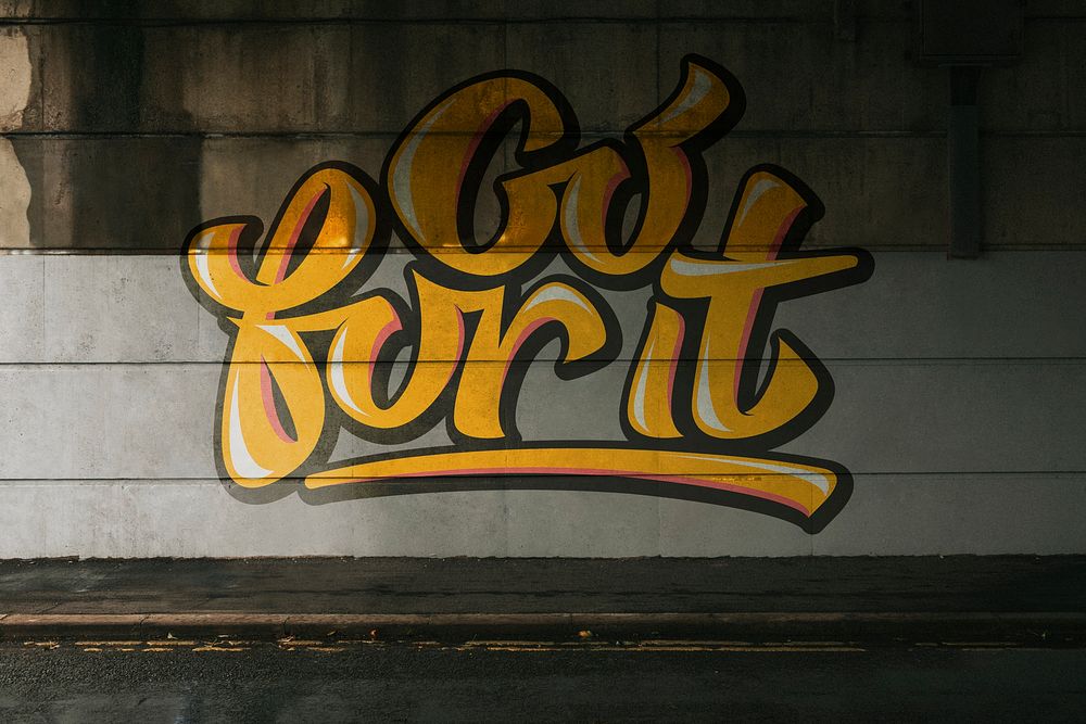 Go for it graffiti on the grunge wall under the bridge background image