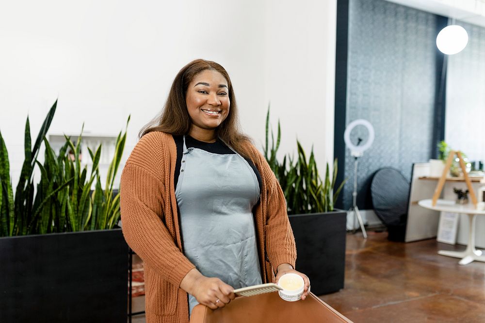 Smiling small beauty salon owner 