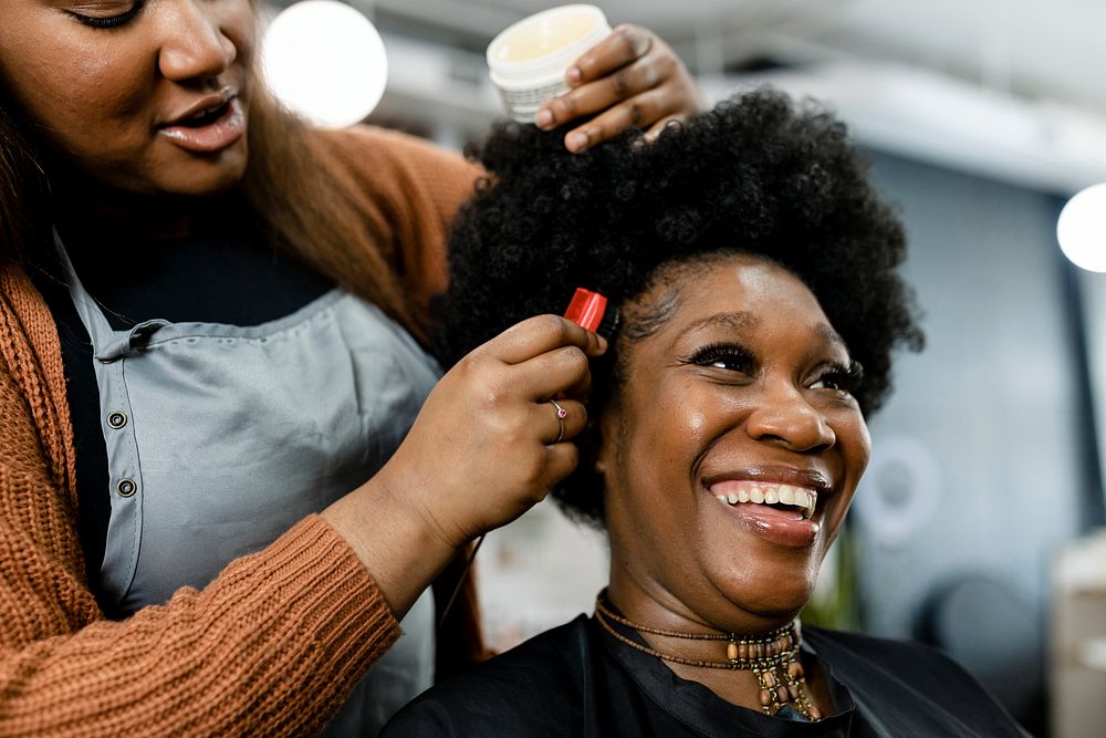 Customer getting a hairdo at a beauty salon 