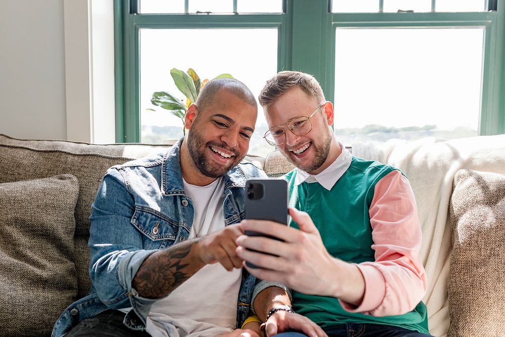 Happy gay couple image, video calling with friends
