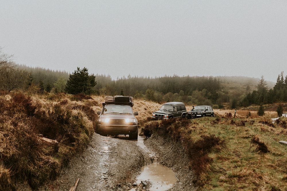 Cars driving through the off-roading path