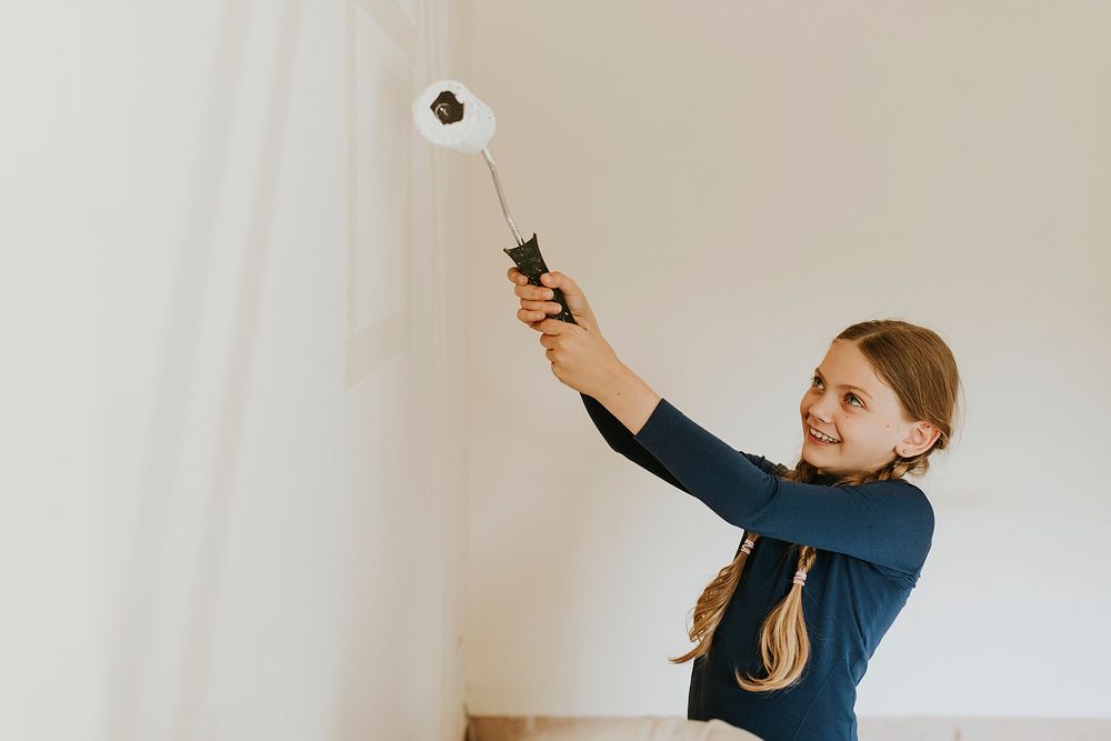 Girl paint white empty room