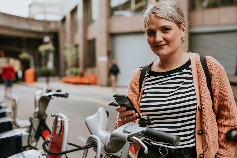 Woman connecting to a bike rental application