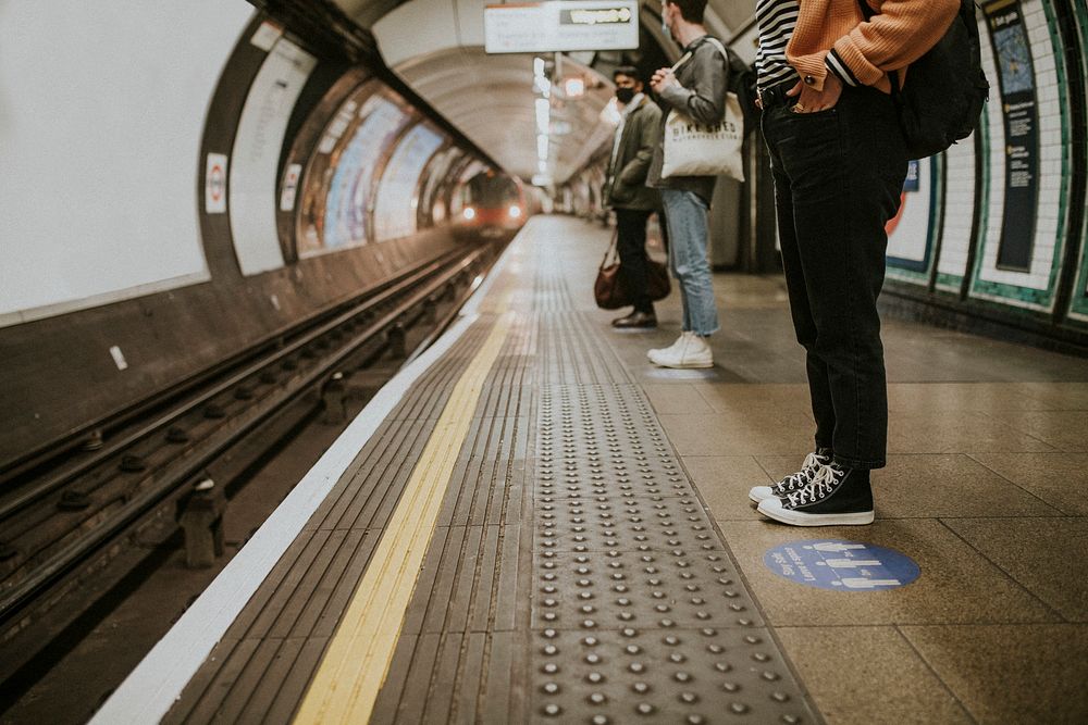 Passengers waiting for a train on a platform 