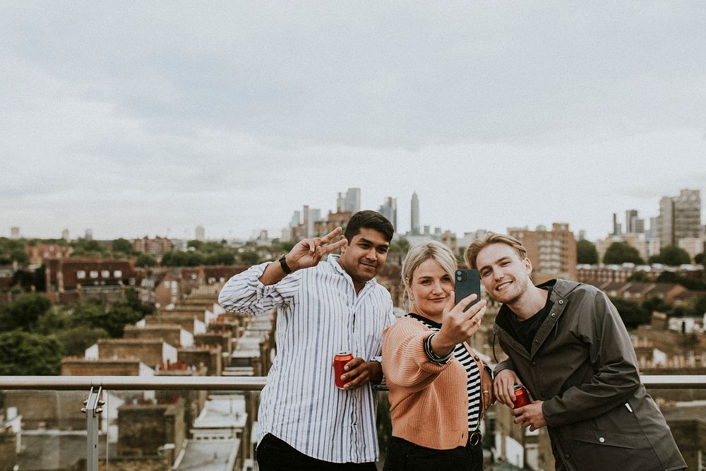 Friends taking a group selfie 