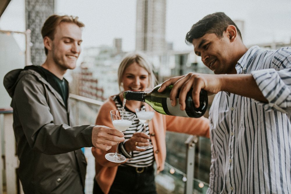 Friends celebrating on a rooftop