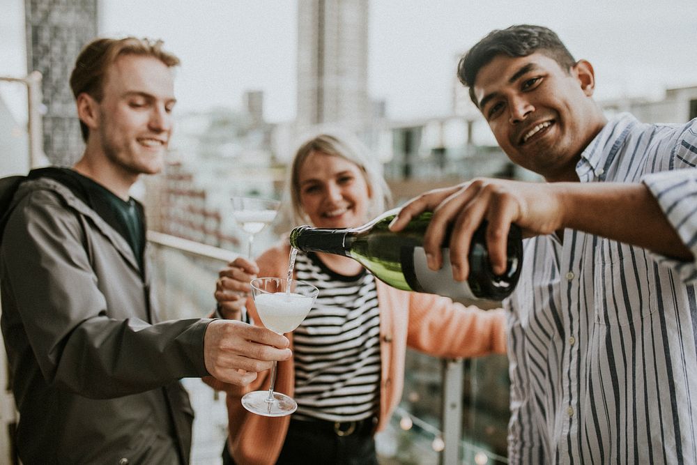 Friends celebrating on a rooftop