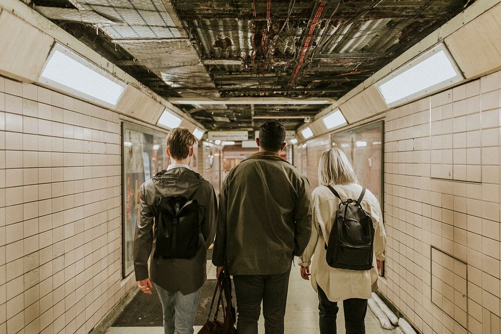 People walking through the underground tunnel 
