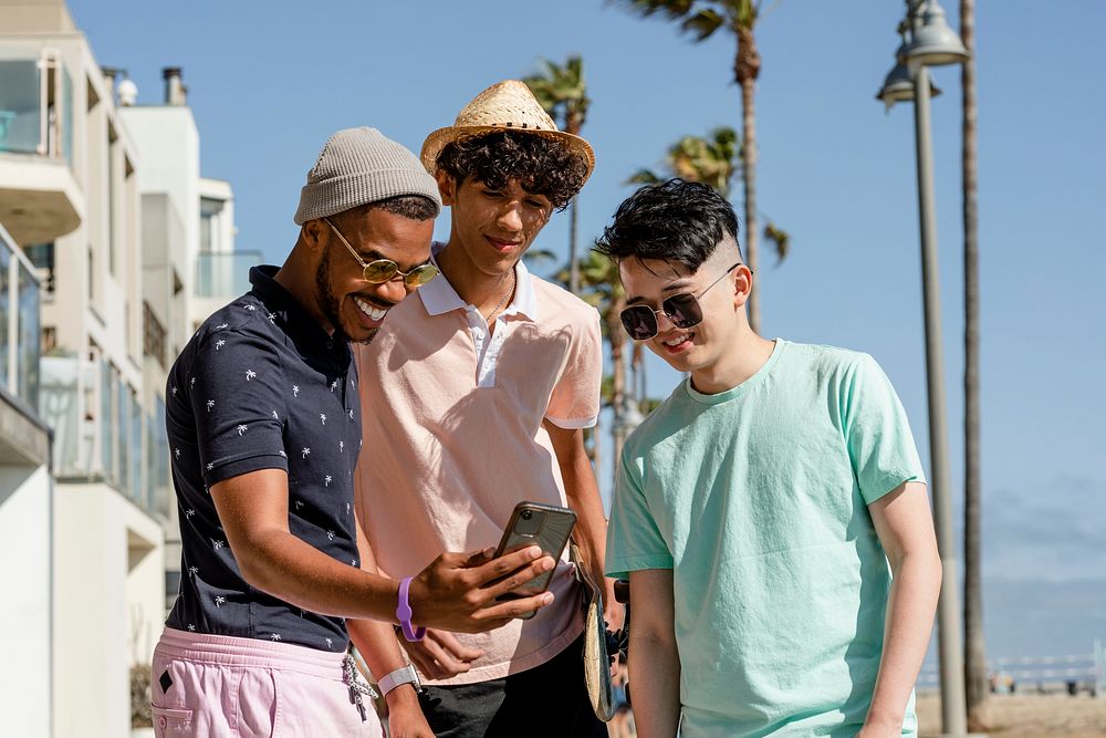 Social media share, teen boys watching viral content