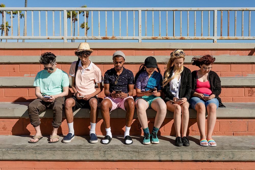 Teenagers using smartphones, social media connection