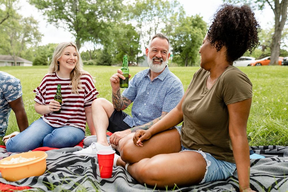 Friends having a picnic in the park