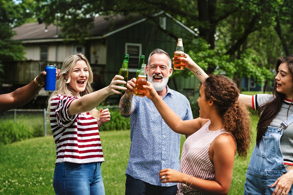 Freinds having drinks together in the park