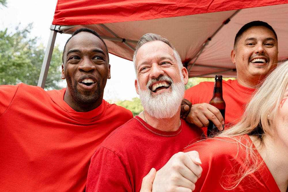 Friends partying at a tailgate event