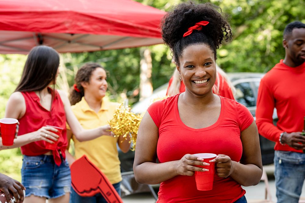 African American woman at a tailgate party