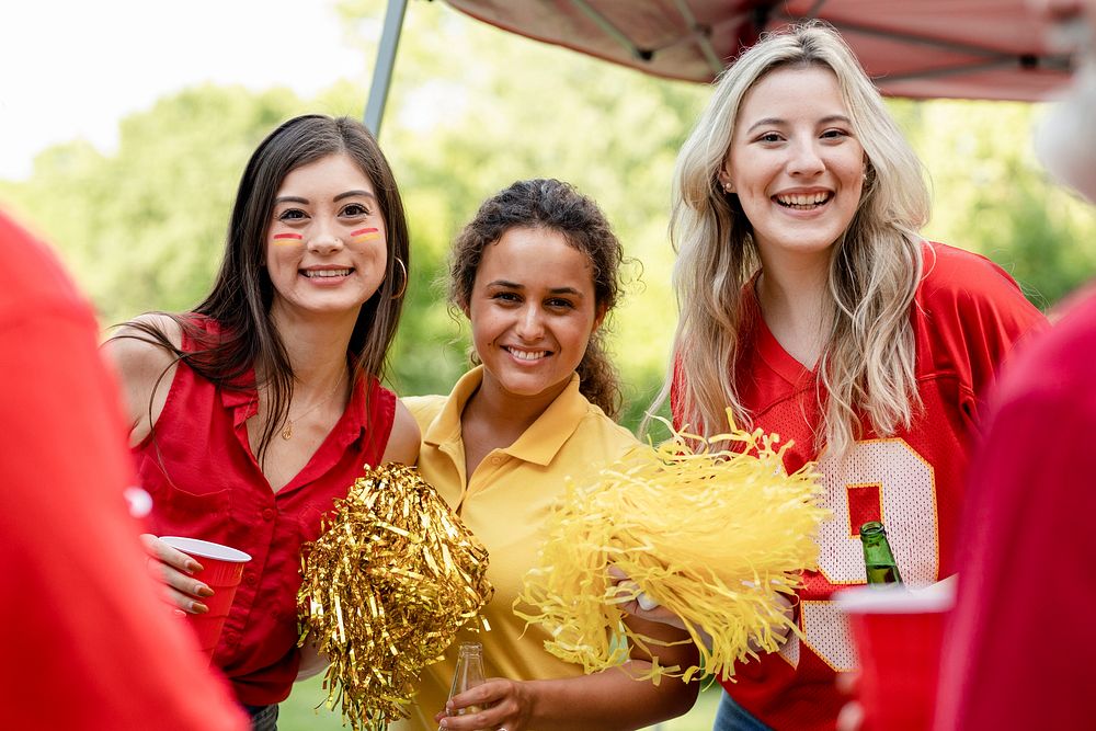 Cheerleaders at a tailgate party
