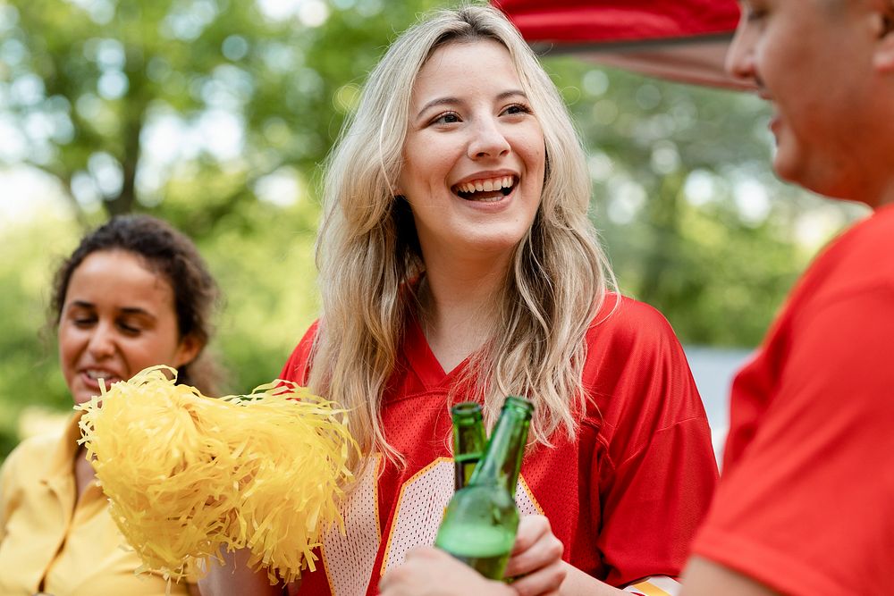 Cheerleader at a tailgate party