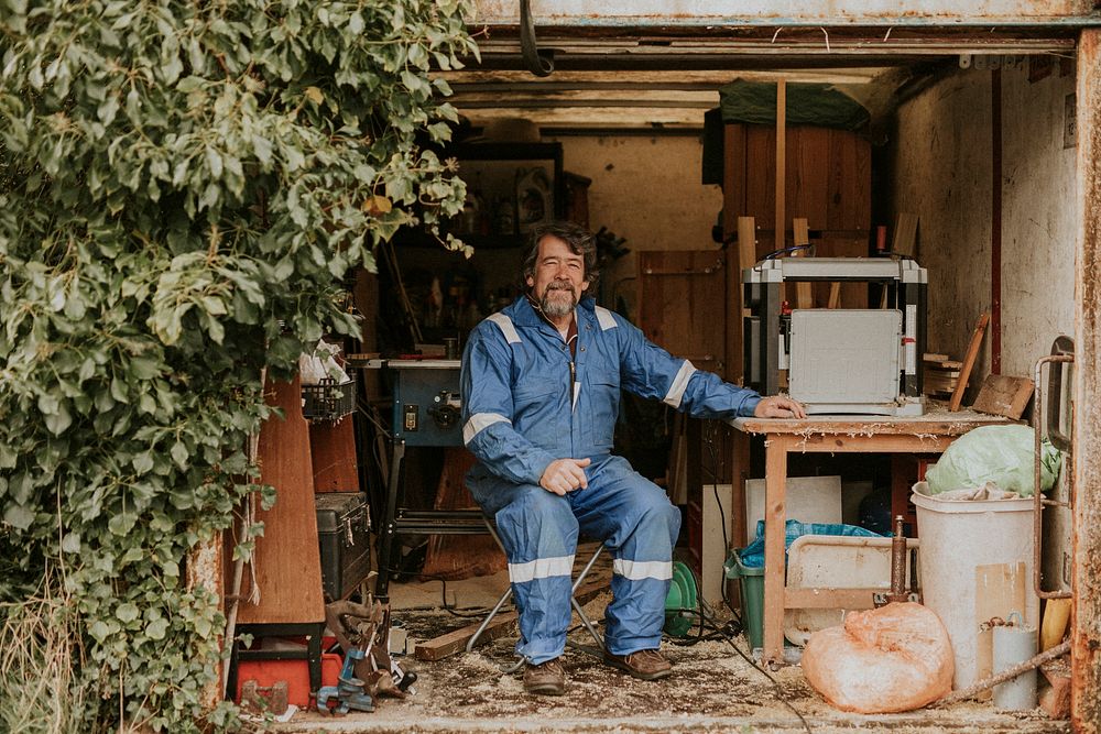 Senior carpenter working in his wood workshop
