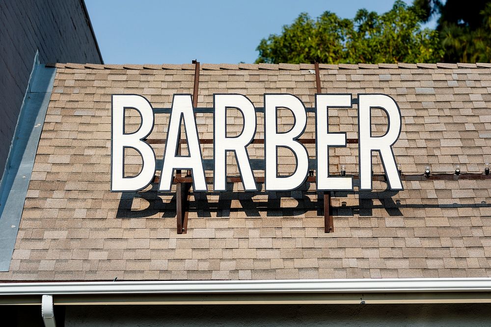 Barber shop sign on roof, business identity branding