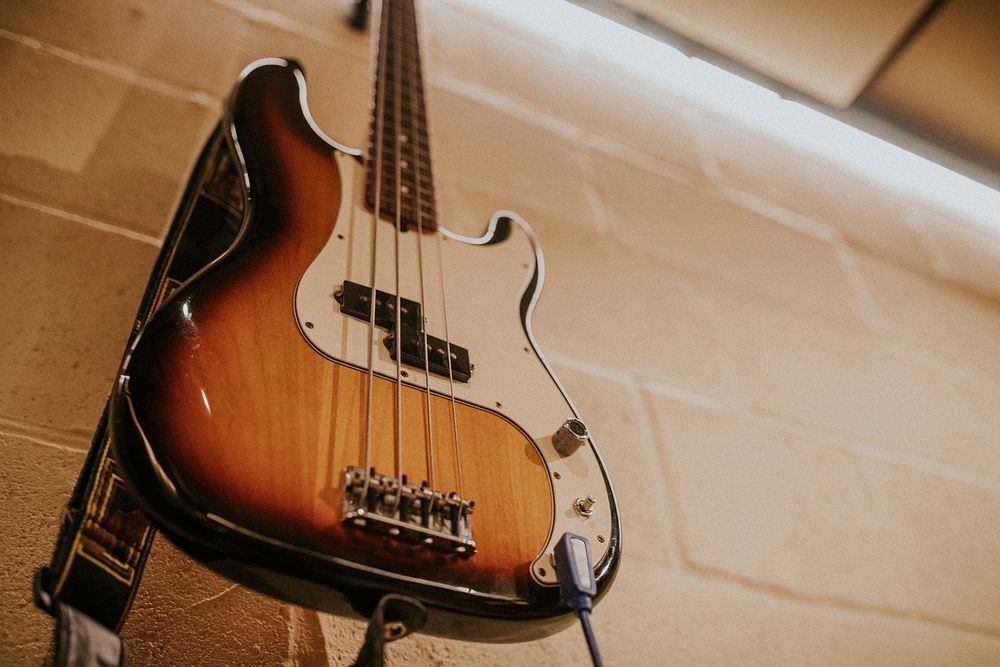 Bass guitar musical instrument, studio recording session photo