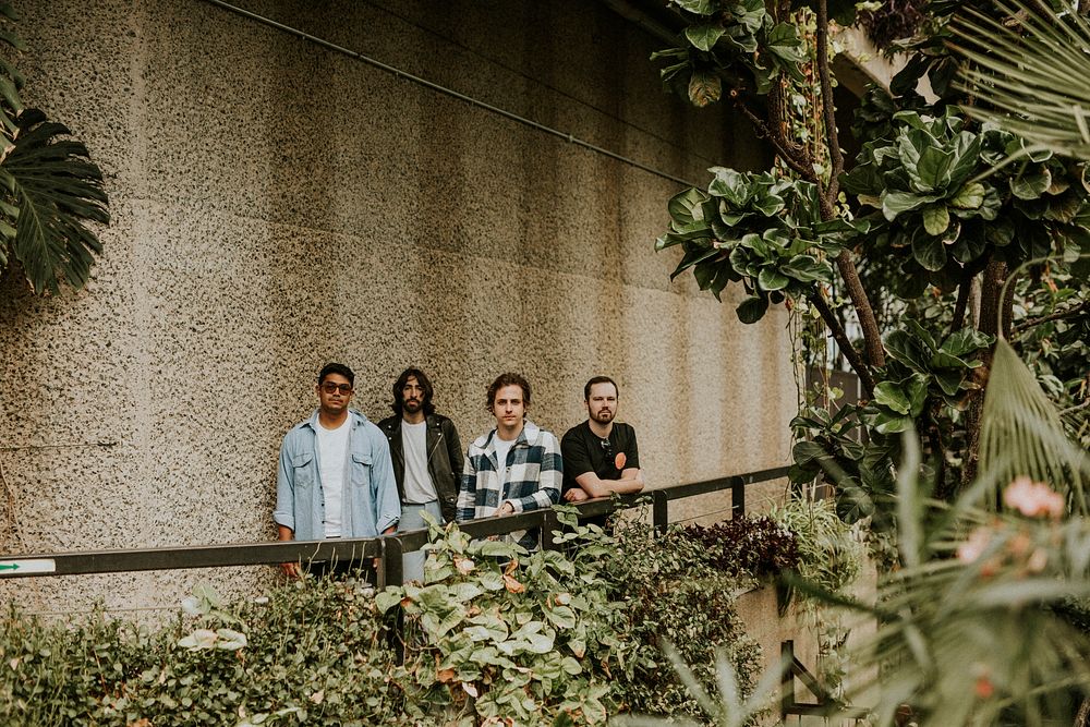 Men posing in garden, botanical greenhouse photoshoot 