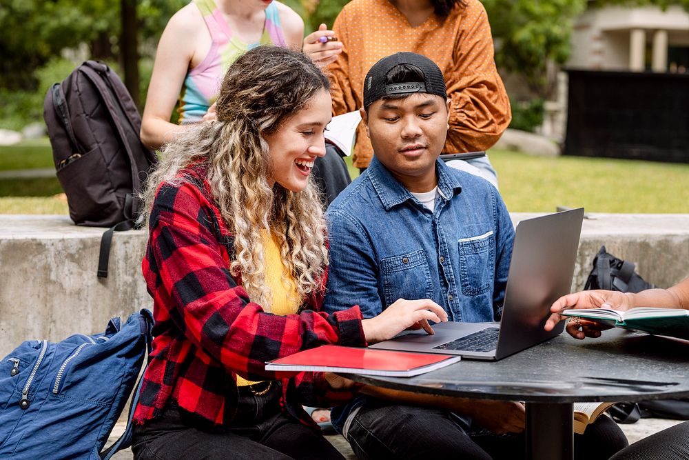 Diverse exchange students studying together at American university