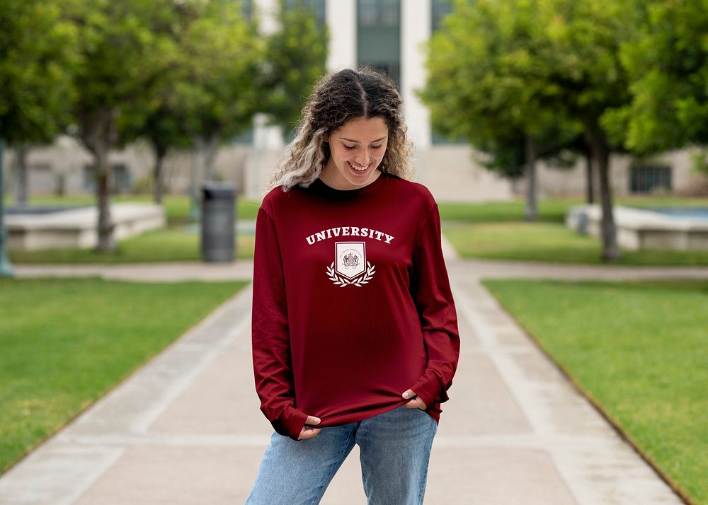 Girl wearing university jumper at campus, college apparel