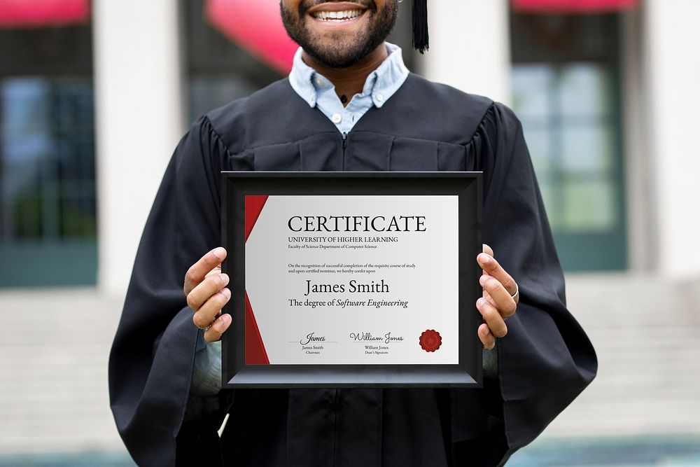 Graduating student holding academic certificate