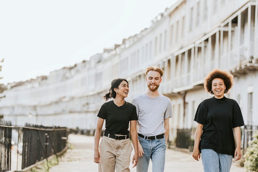 Three friends strolling in the city 