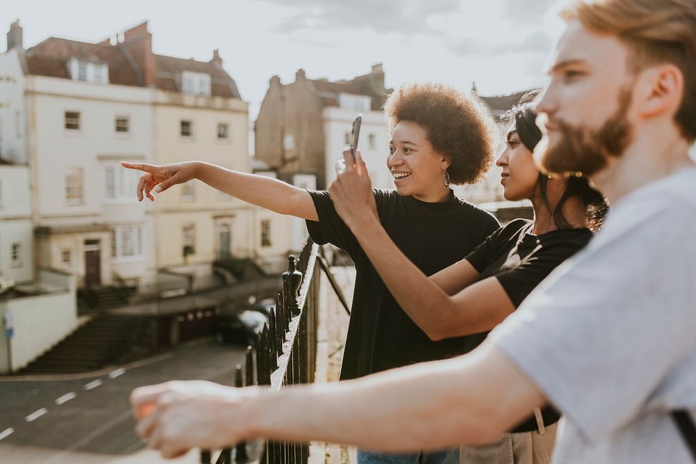 Three friends sightseeing in the city