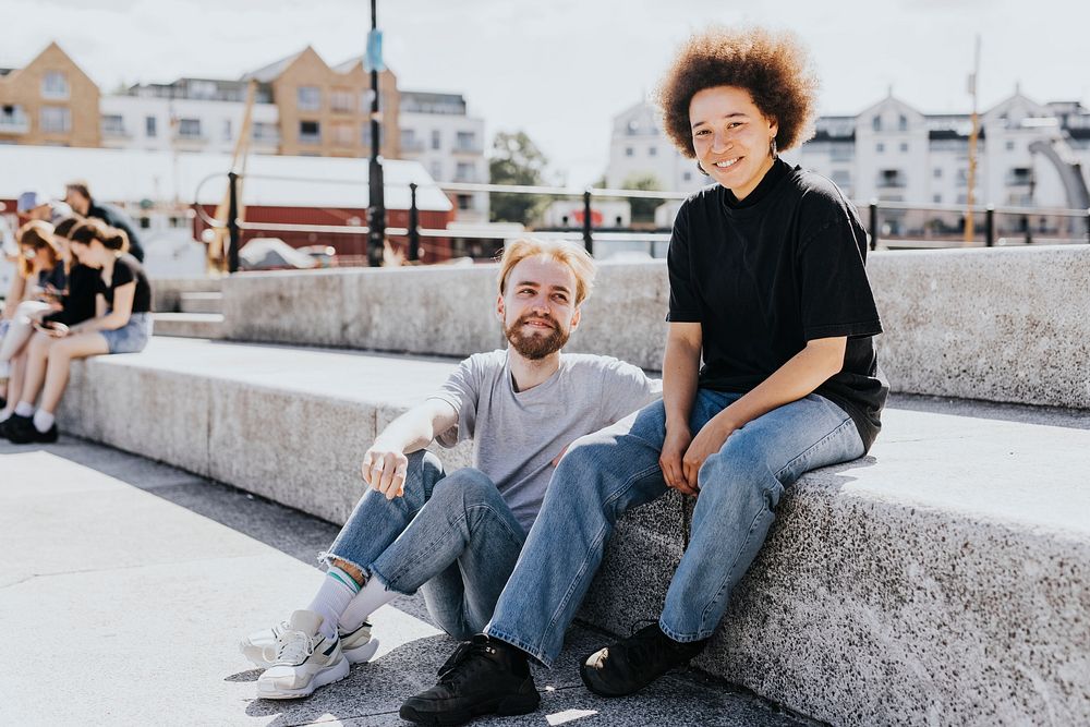 Two friends sitting on the steps