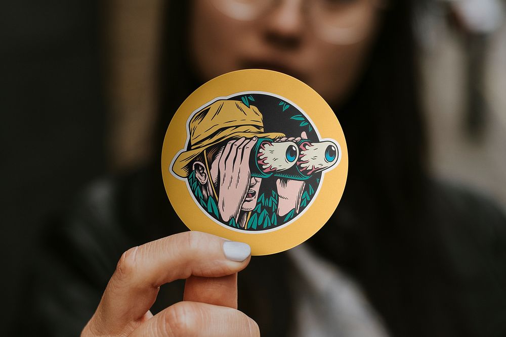 Round sticker mockup psd, held by woman