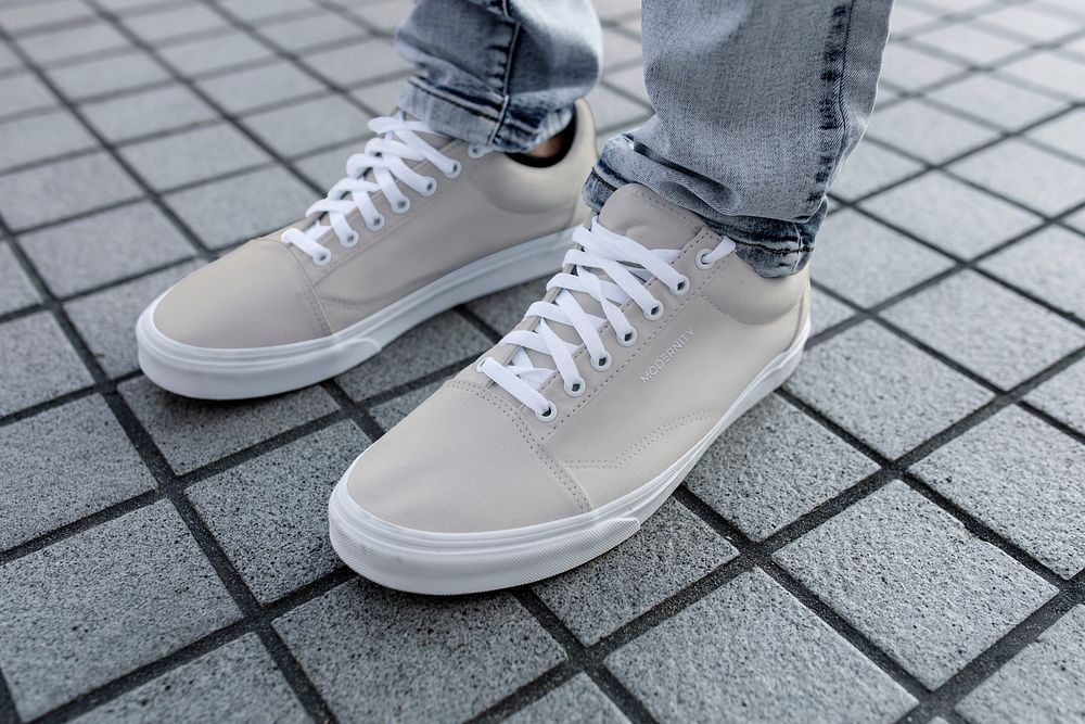 Footwear sneaker mockup, men's casual sneaker psd on a grey tiled floor