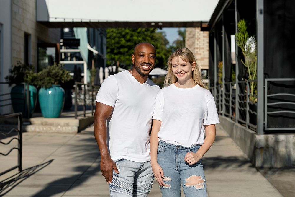 Happy couple enjoying a summer date, wearing plain white tee