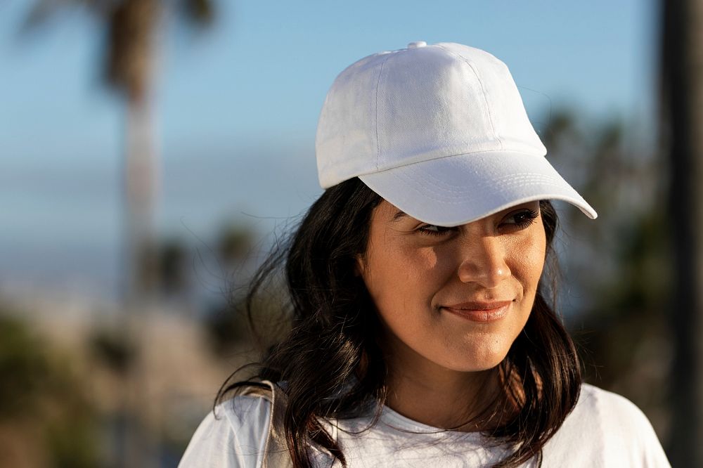 Latina woman wearing cap, a plain white hat