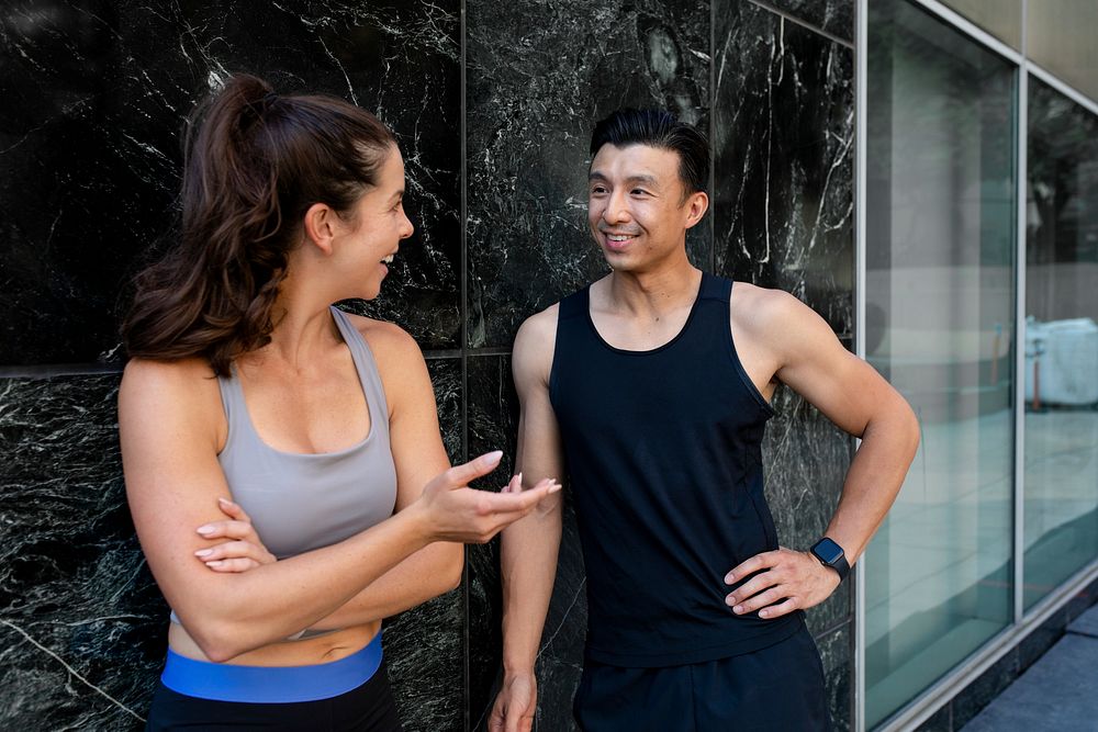 Woman talking to her workout buddy