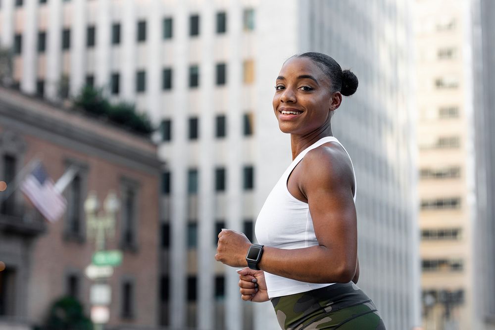 Sporty woman in athleisure clothing in the city