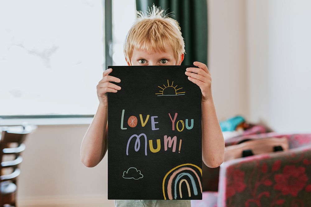 Sign mockup psd, held by a boy, blank design space, love you mom text