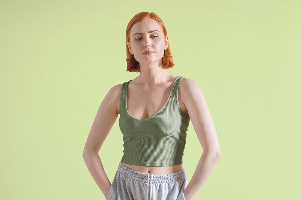 Woman in green tank top portrait, sleepwear apparel fashion