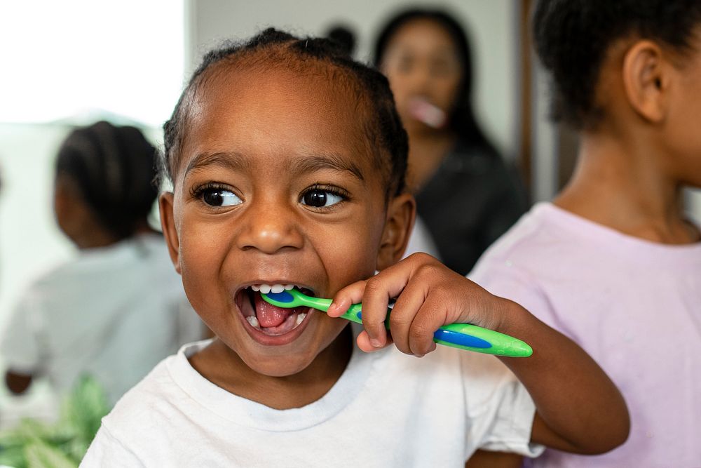 Boy brushing his teeth, dental & hygiene concept