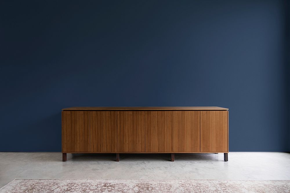 Blue wall, modern home decor with wooden sideboard