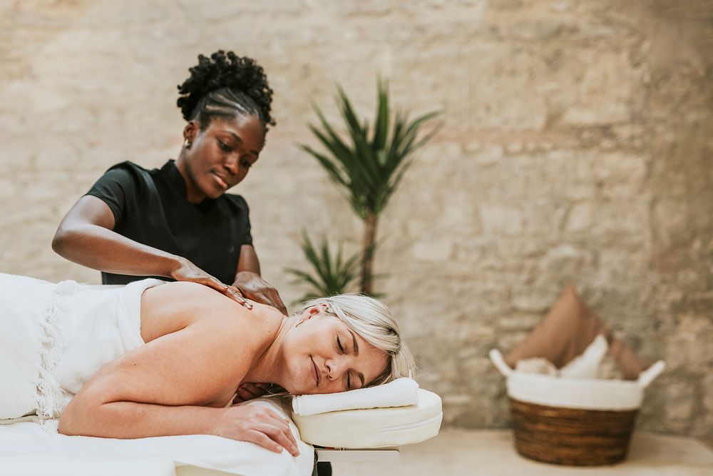 Woman enjoying massage therapy, self-care photo